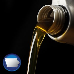 pouring motor oil, on a black background - with Iowa icon