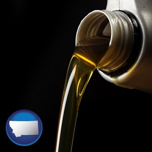 pouring motor oil, on a black background - with Montana icon
