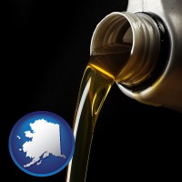 alaska pouring motor oil, on a black background