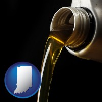 indiana pouring motor oil, on a black background