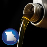 missouri pouring motor oil, on a black background