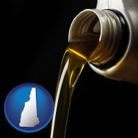new-hampshire pouring motor oil, on a black background