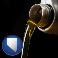 nevada pouring motor oil, on a black background