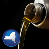 new-york pouring motor oil, on a black background