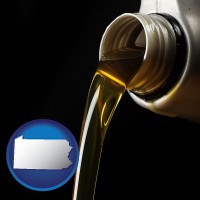 pennsylvania pouring motor oil, on a black background