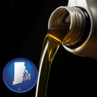 rhode-island pouring motor oil, on a black background