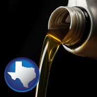 texas pouring motor oil, on a black background