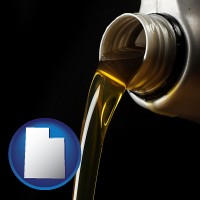 utah pouring motor oil, on a black background