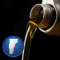 vermont pouring motor oil, on a black background