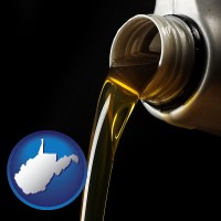 west-virginia pouring motor oil, on a black background